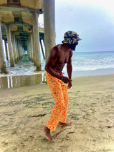 Load image into Gallery viewer, The Sungodz "World" custom printed Jam Pant in Tangerine.