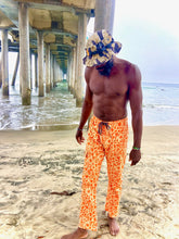 Load image into Gallery viewer, The Sungodz "World" custom printed Jam Pant in Tangerine.