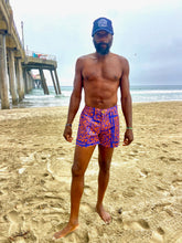 Load image into Gallery viewer, SOLD OUT - The Sungodz "World" Walkshort - in Amalfi Blue with Tangerine print.
